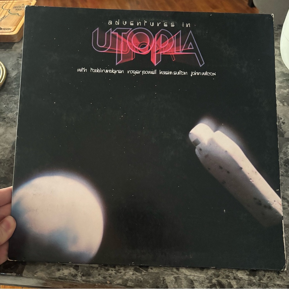 Colorful Album Cover with Iconic Artists